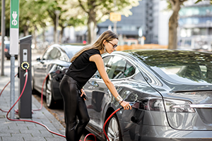 woman-charging-ev